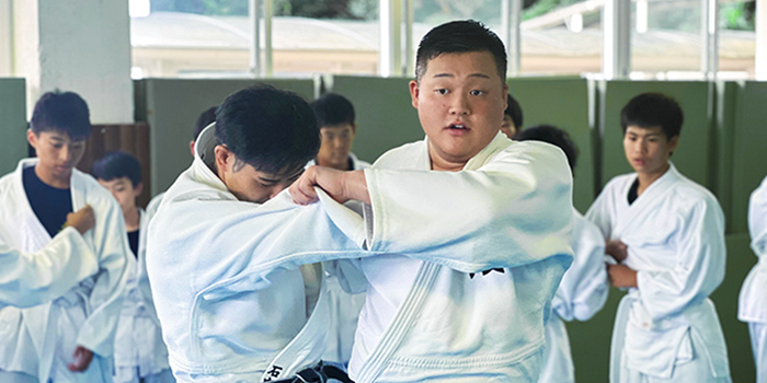 Students at a judo lesson