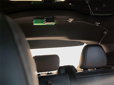 Millimeter-wave radar module installed in demo car, compared with industry-standard (green)